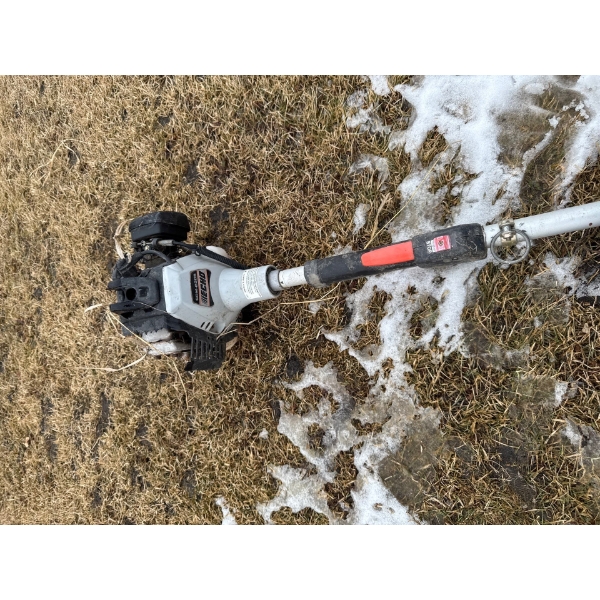 An Echo Whippersnapper SRM-230 grass trimmer. 2-stroke gasoline engine. Designed for trimming grass 