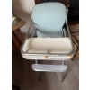 Image 3 : High chair with chrome metal frame, light blue upholstered vinyl seat and back, white footrest, and 