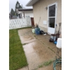 Image 2 : Various outdoor tools and garden equipment such as hoses, buckets, plastic containers, extension cor