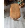 Image 4 : Wooden side table featuring a rectangular top with beveled edges and a decorative cutout base. The t