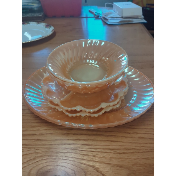 Vintage fire king peach luster dishes considered collectable