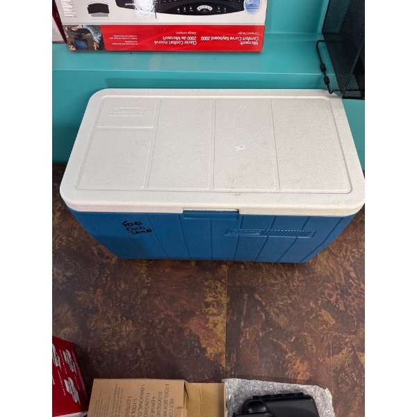 Vintage table and Coleman cooler 59 inches long by 35 1/2 inches wide by 30 inches