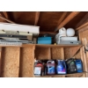 Image 4 : All items located in the corner, including various containers, household equipment, and miscellaneou