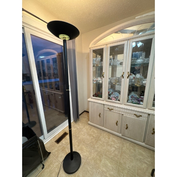  Black metal halogen torchiere floor lamp. 