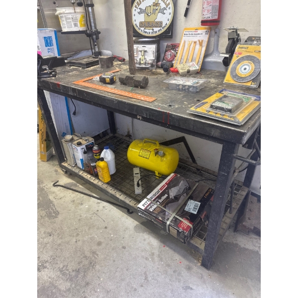 Steel work bench only, contents not included, it is 62in wide 38in tall and 30in deep