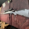Image 4 : Ruger American bolt action rifle chambered in .243 Win, matte grey speckled synthetic stock, fluted 