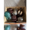 Image 1 : Lot containing several metal clamps and a variety of glass and ceramic electrical insulators in mixe