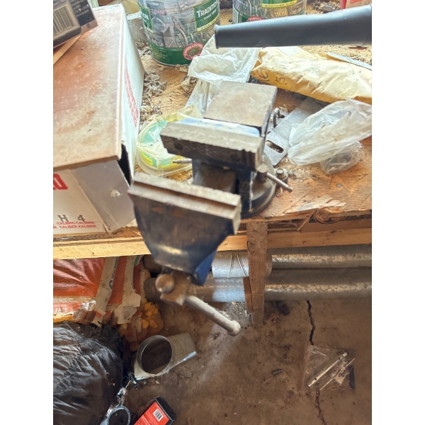 Back corner of shop, all contents included, including hijack, bench.