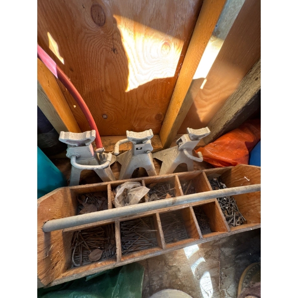 Three jack stands and hand nail box.