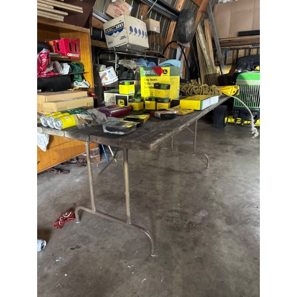 Six foot folding wood table. Very sturdy. Very strong. Nice.