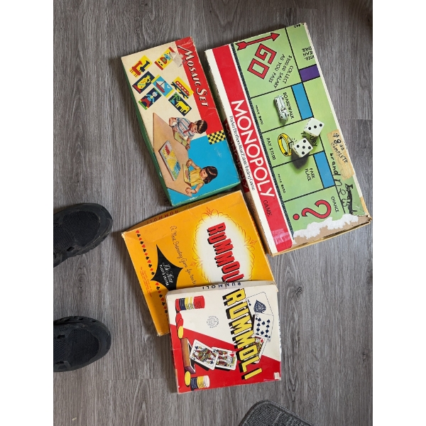 Group lot including Monopoly, Rummikub, a Mosaic Set, and another Rummikub edition. Set includes ori