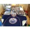 Image 3 : Oilers jersey with hockey board game, Oilers figurines, NHL figures, collectible items. Jersey is si