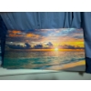 Image 1 : This is a canvas wall art print featuring a seascape sunset, potentially of Grace Bay Beach in Provi