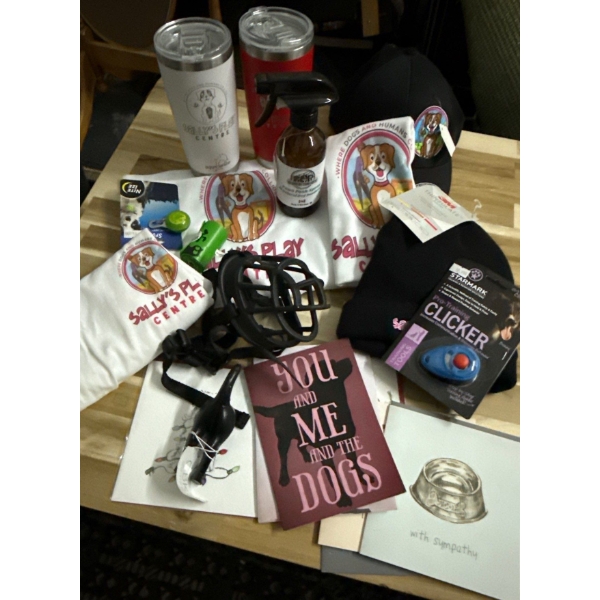 Puppy collectables and toiletries, T-shirts, badges, coffee, cups, and more Muzzle collar, poop bags