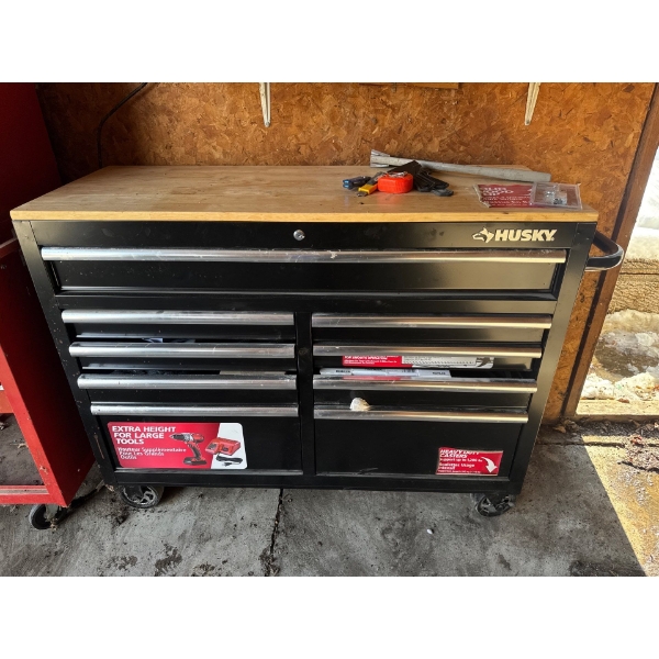 Husky 46-inch 9-Drawer Mobile Workbench.  It features a solid wood top providing 837 square inches o