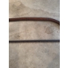 Image 2 : Steel bow saw featuring a curved frame and toothed blade, suitable for cutting wood. The frame displ