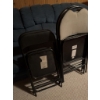 Image 4 : Four folding chairs including two with black metal frames and vinyl seats and two with black metal f