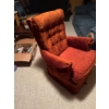 Image 3 : One blue fabric sofa with wood trim and one orange upholstered armchair with tufted back and wide ar