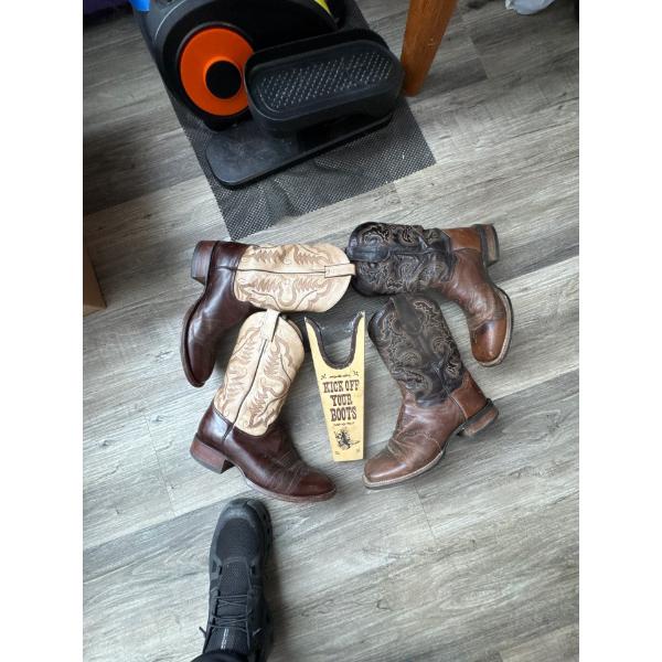  Dan Post men's western boots, model number DP 2815, featuring a leather upper and a rubber sole. 