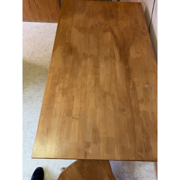 Wood dining table with turned legs and single drawer, includes two matching wooden spindle-back chai