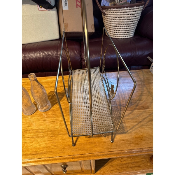 Brass magazine rack.