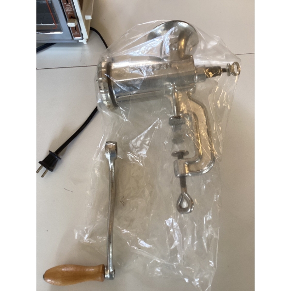  Meat grinder and meal maker two toaster oven. Vintage. Works perfect.
