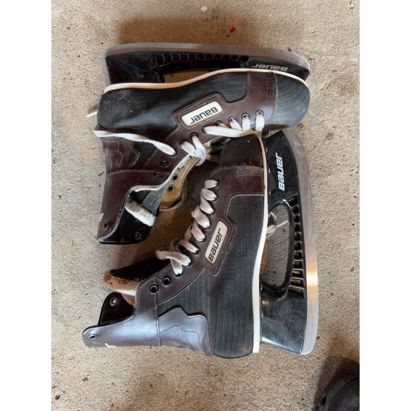 Pair of size 8 skates. The skates are suitable for ice use and are designed for performance and comf