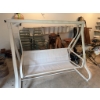 Image 1 : Outdoor swing featuring a cream-colored metal frame and mesh seat. Suitable for patio or garden use.