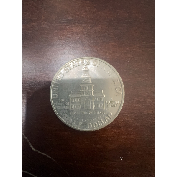 United States Kennedy half dollar minted for the Bicentennial in 1976. Features Independence Hall on