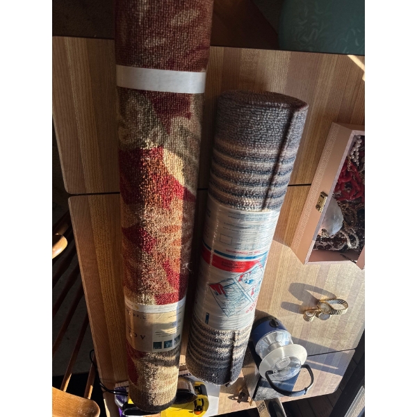 Two entryway mats. The smaller blue and white one is the 72 inch Carpet runner. The second one is Ac