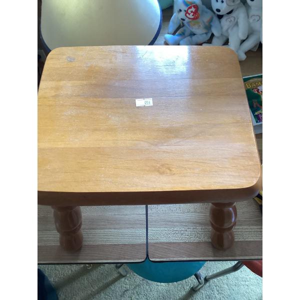 Wooden step stool, one foot high. Very sturdy.