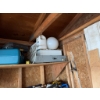 Image 2 : All items located in the corner, including various containers, household equipment, and miscellaneou