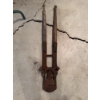 Image 1 : Antique post hole digger with cast iron mechanical components and wooden handles. Designed for manua