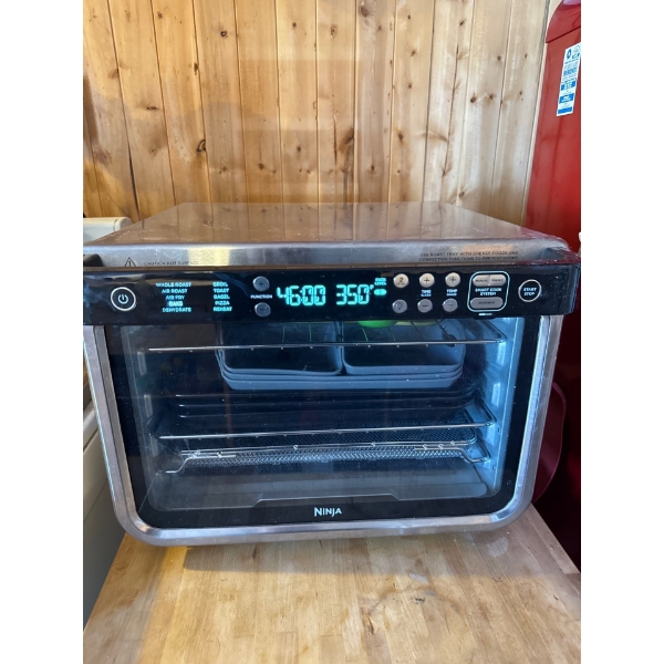 A Ninja Foodi 10-in-1 XL Pro Air Fry Oven, a high-capacity countertop convection oven. Provides up t