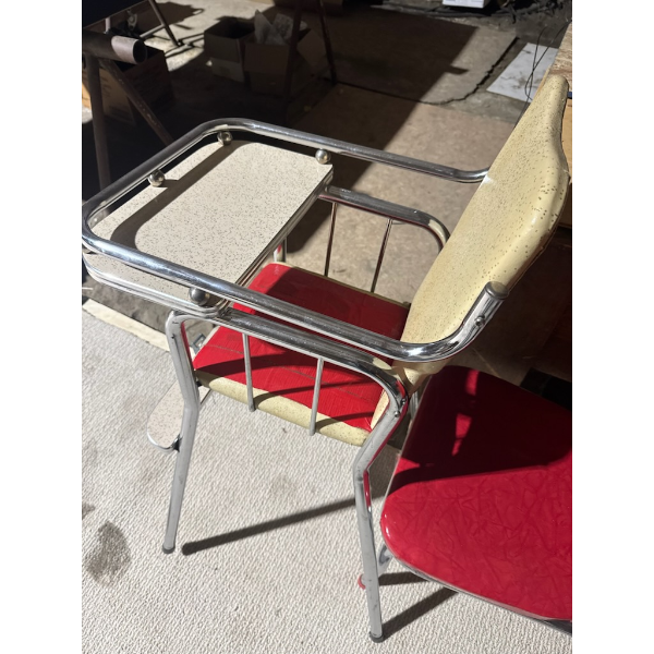 6 retro diner chairs featuring red vinyl upholstery, chrome frames, and decorative nailhead trim. Th