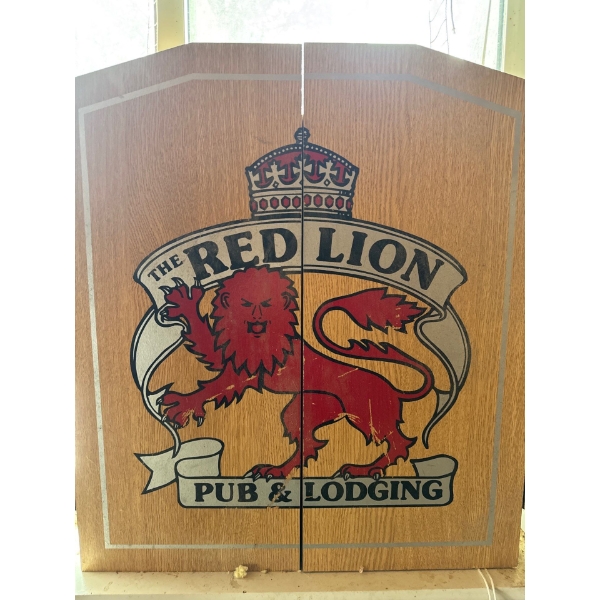  collectible Red Lion Pub & Lodging dart board cabinet. 
Features: It consists of a wooden cabinet w
