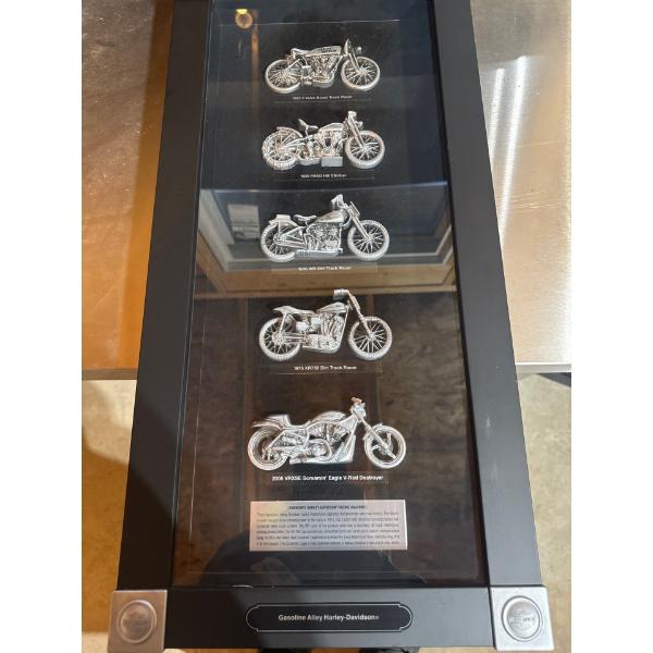 Harley Davidson framed legendary racing machines.