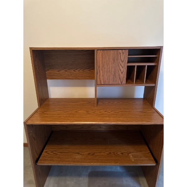  traditional wooden computer desk with an integrated hutch for storage and shelving, commonly referr