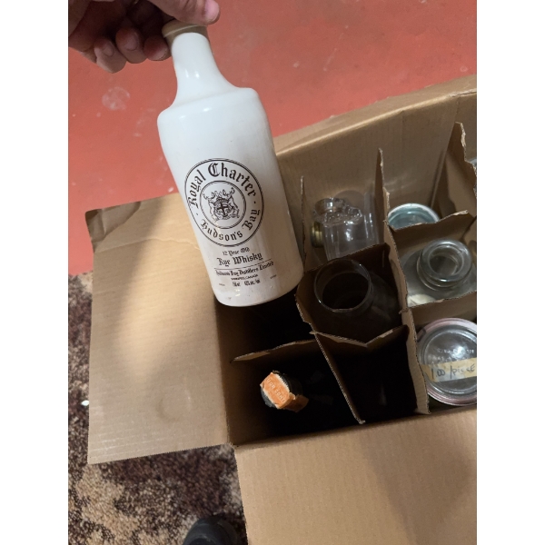 Box of metal nails, assorted glass bottles including a marked Royal Charter whisky jug, a green meta