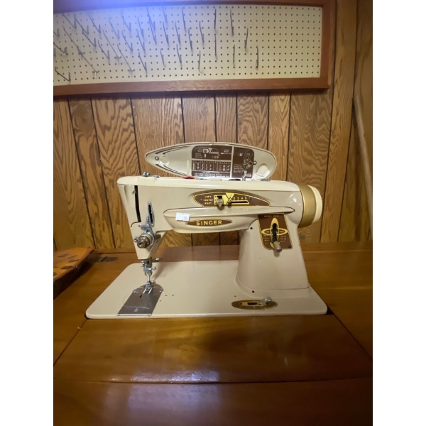 Singer, sewing machine and clock, Elkridge crafts clock, and made in Alberta antique sewing desk and