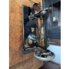 Image 4 : Singer treadle sewing machine, serial number 16165557, featuring original cast iron base and wooden 