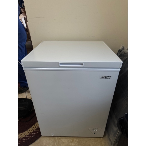 This is an Arctic King chest freezer. 
It offers ample storage space and is designed to take up mini
