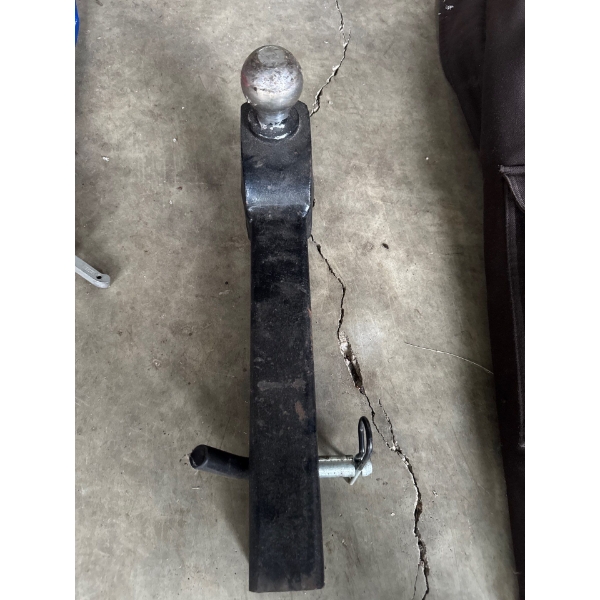Two inch hitch and ball for a trailer.
