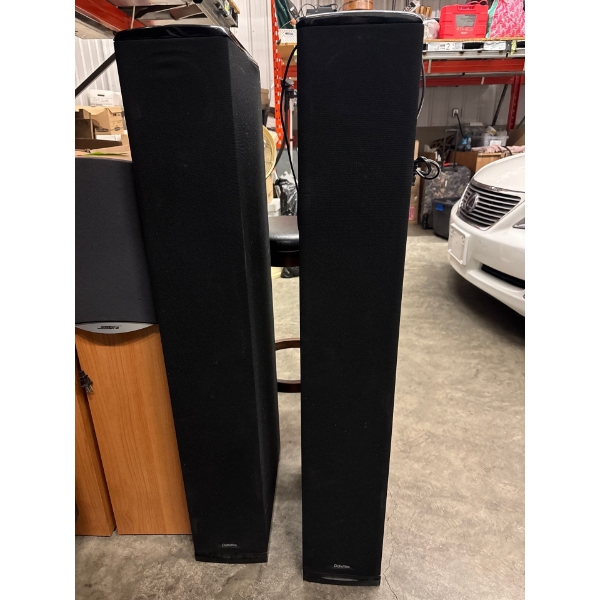 Definitive tower speakers. 46 and a half inches tall. 16 inches deep. Seven and a half inches wide