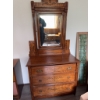 Image 12 : Oak dresser featuring three drawers with brass handles, decorative leaf carving, and attached vertic