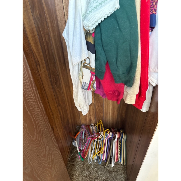 Closet, vintage clothes and coat hangers.