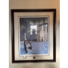 Image 2 :  framed collectible art print depicting a winter rural scene with a broken wooden wagon wheel in the