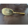 Image 8 : Gold-tone decorative hairbrush featuring ornate detailing on the back and handle and synthetic brist