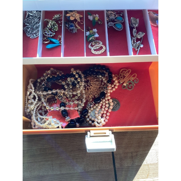 jewelry box full of costume jewelry.