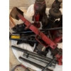 Image 8 : Multiple car jacks including bottle jacks, scissor jacks, a mechanical ratchet jack, iron bars, and 